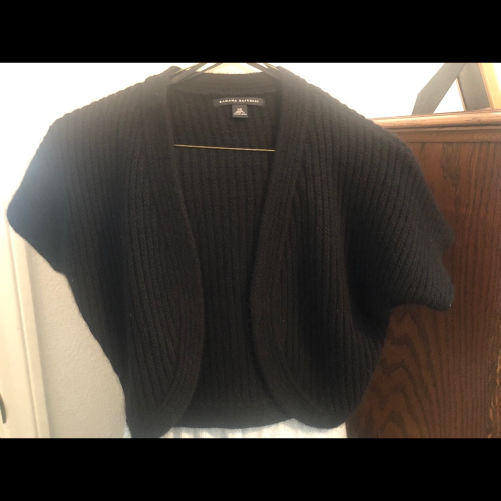 Women’s black bolero shrug.